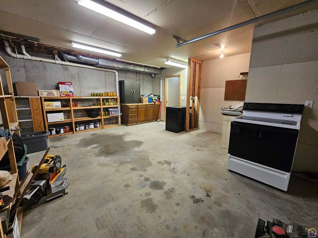 1525 SW Village DR, Topeka, KS 66604