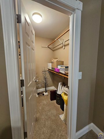 1525 SW Village DR, Topeka, KS 66604