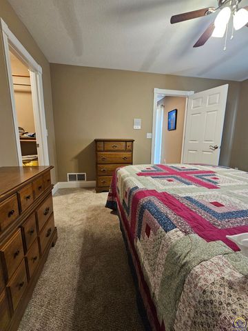 1525 SW Village DR, Topeka, KS 66604