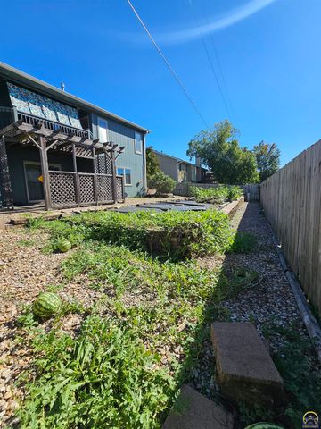 1525 SW Village DR, Topeka, KS 66604