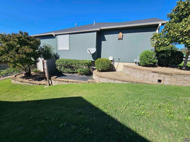 1525 SW Village DR, Topeka, KS 66604