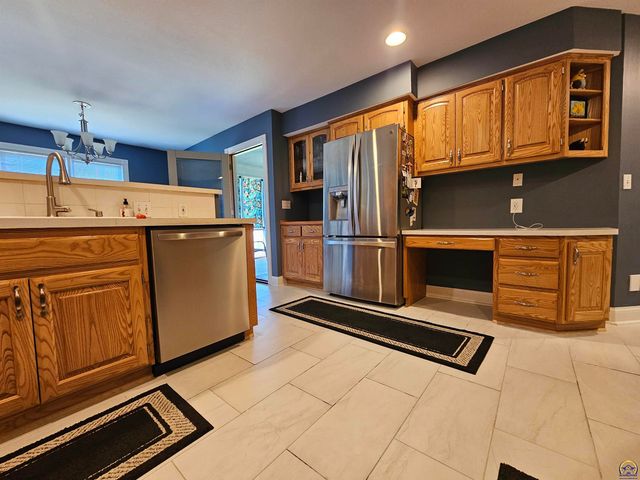 1525 SW Village DR, Topeka, KS 66604