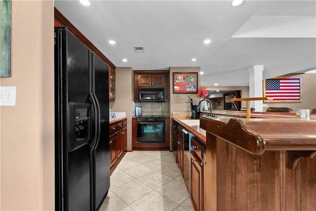 13801 S Pebblebrook Lane, Greenwood, MO 64034