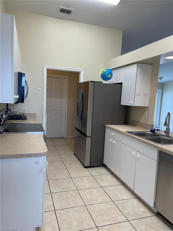 3002 28th ST SW, LEHIGH ACRES, FL 33976 — photo 4