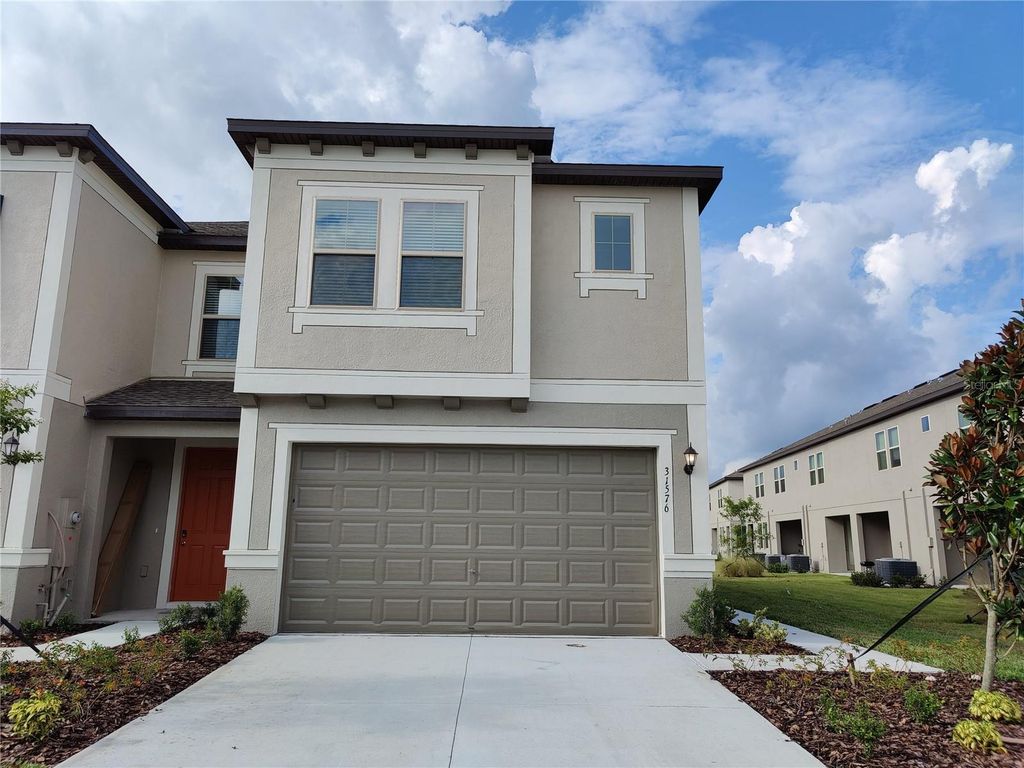 Image 1 of property listing at 31576 BLUE PASSING LOOP, Wesley Chapel, FL 33545