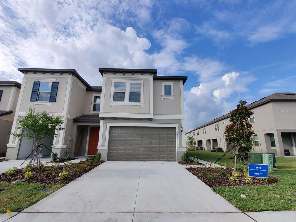 Image 2 of property listing at 31576 BLUE PASSING LOOP, Wesley Chapel, FL 33545