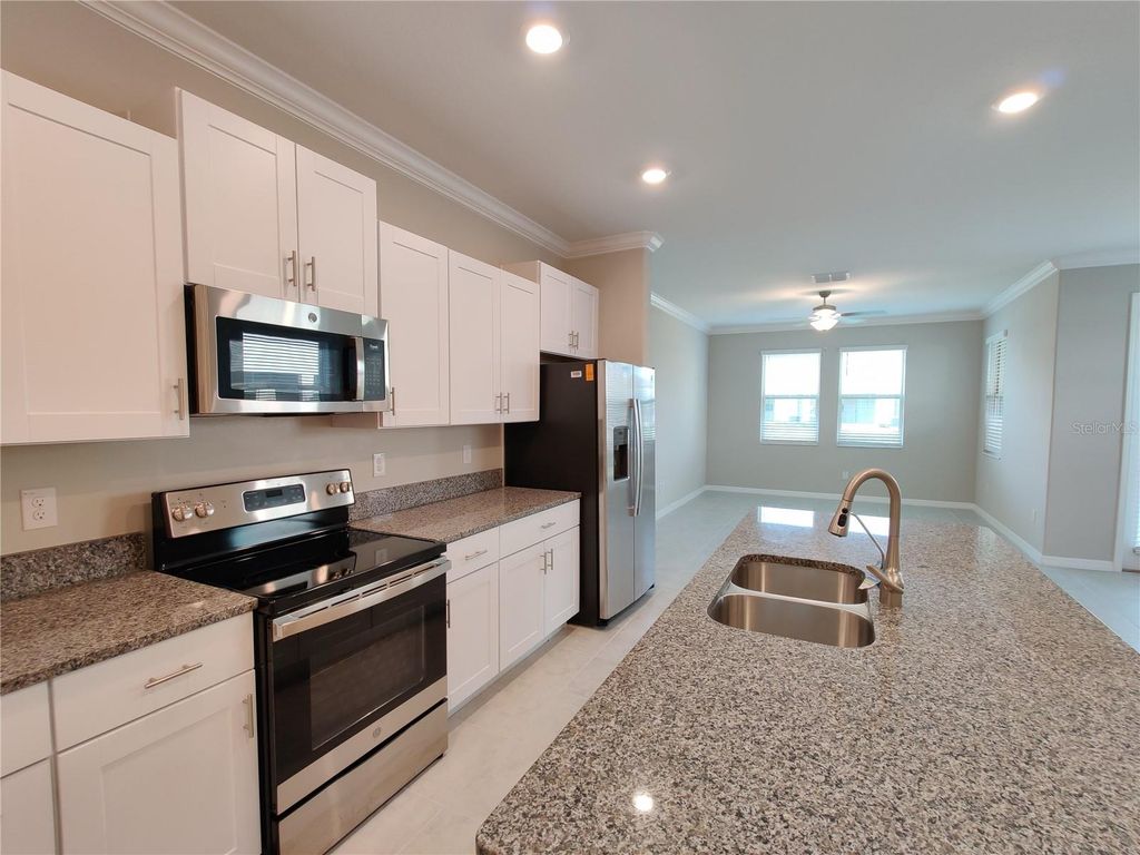 Image 6 of property listing at 31576 BLUE PASSING LOOP, Wesley Chapel, FL 33545