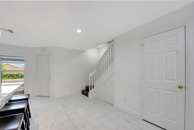 3871 Patio Court, Palm Springs, FL 33461