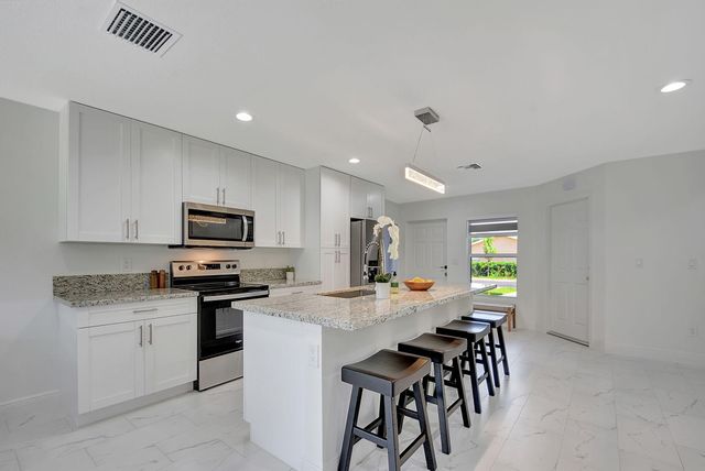 3871 Patio Court, Palm Springs, FL 33461