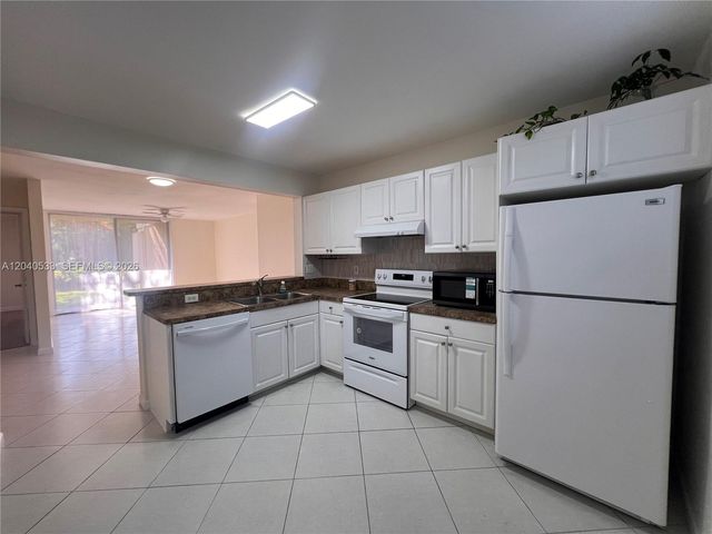 5661 Riverside Drive 101B7, Coral Springs, FL 33067