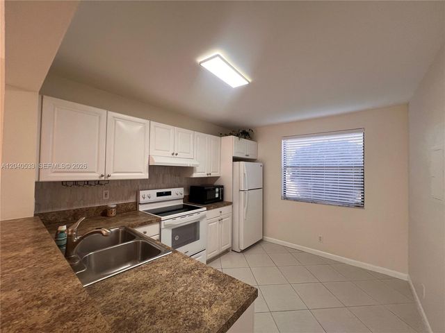 5661 Riverside Drive 101B7, Coral Springs, FL 33067