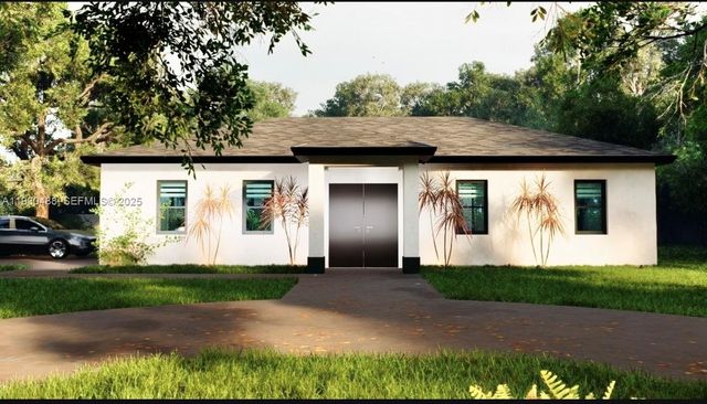 911 Ardmore St, Lehigh Acres, FL 33974