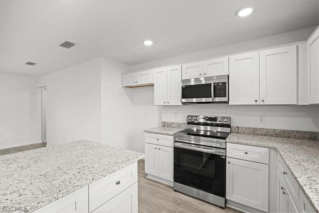 1242 Echard ST E, Lehigh Acres, FL 33974