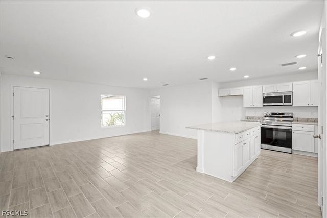 1242 Echard ST E, Lehigh Acres, FL 33974