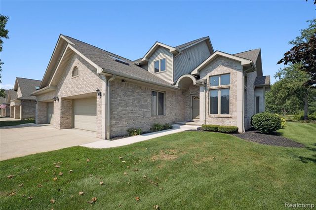 628 Olde Ivy Lane, Howell, MI 48843