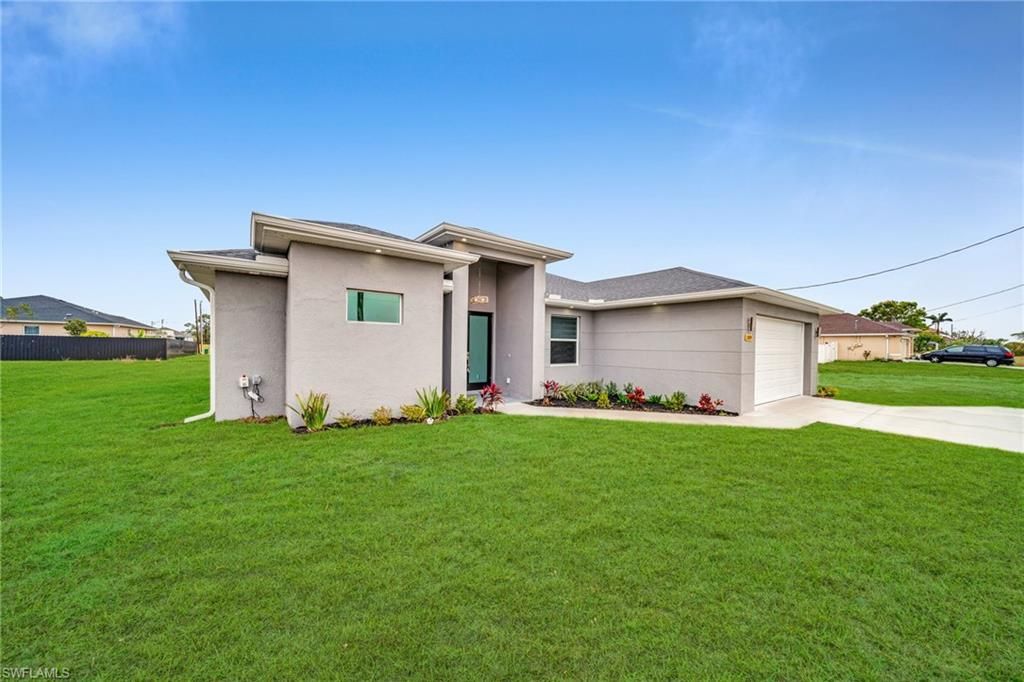 1009 El Dorado BLVD N, CAPE CORAL, FL 33993 — photo 2