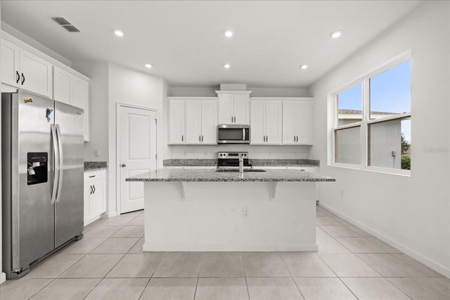 1051 LAKESHORE BREEZE PLACE, Kissimmee, FL 34747