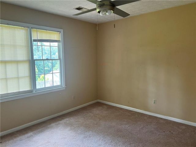 1725 Spindle Top SW Court, Lilburn, GA 30047