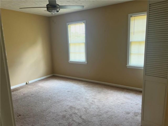 1725 Spindle Top SW Court, Lilburn, GA 30047