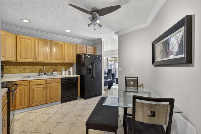 9 Lexington Lane E F, Palm Beach Gardens, FL 33418