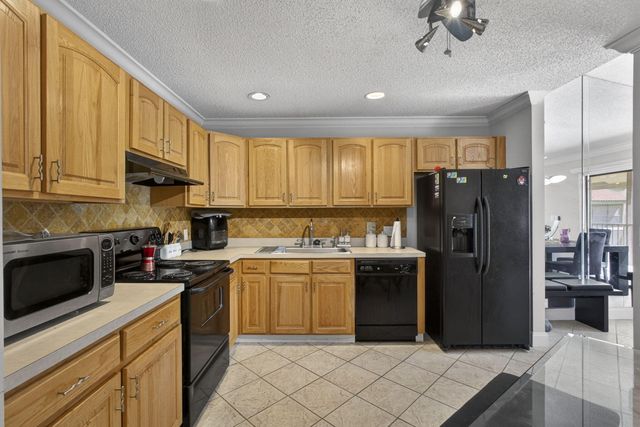 9 Lexington Lane E F, Palm Beach Gardens, FL 33418