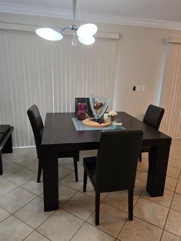 9 Lexington Lane E F, Palm Beach Gardens, FL 33418