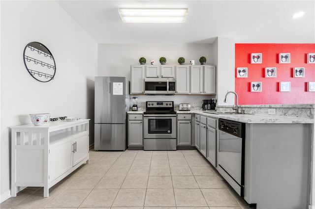 7677 FITZCLARENCE STREET, Kissimmee, FL 34747
