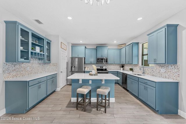 4697 Broomsedge Circle, West Melbourne, FL 32904