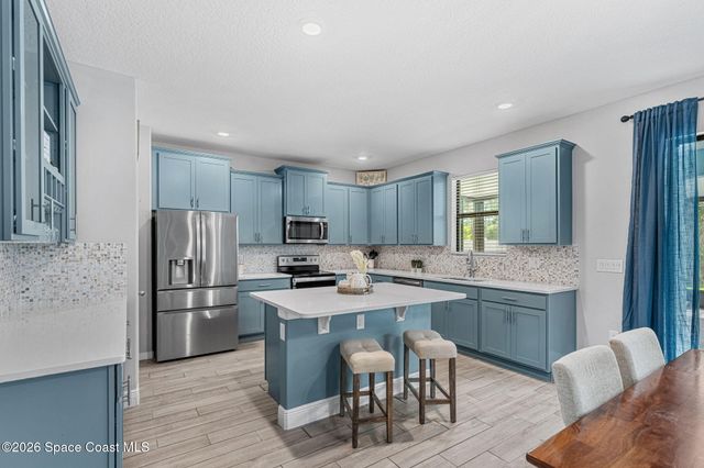 4697 Broomsedge Circle, West Melbourne, FL 32904
