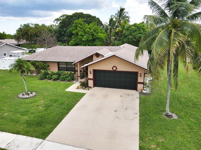 145 Santa Monica Avenue, Royal Palm Beach, FL 33411