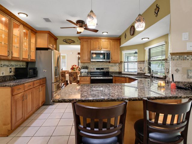 145 Santa Monica Avenue, Royal Palm Beach, FL 33411