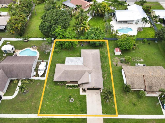145 Santa Monica Avenue, Royal Palm Beach, FL 33411