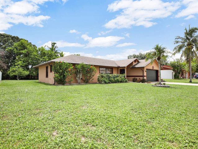 145 Santa Monica Avenue, Royal Palm Beach, FL 33411