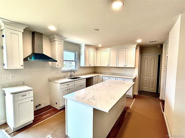 69 Offaly Street, Amityville, NY 11701