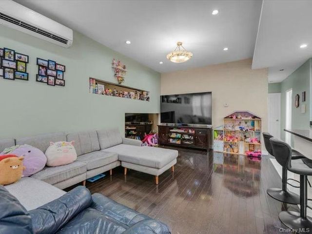 7726 Kneeland Avenue, Elmhurst, NY 11373