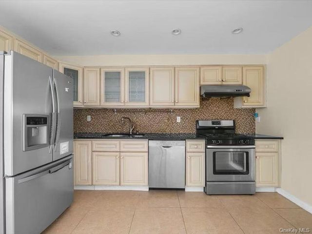 7726 Kneeland Avenue, Elmhurst, NY 11373