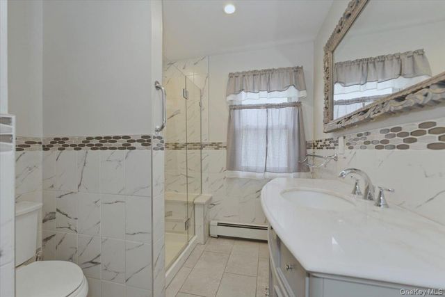 85 Spencer Avenue, Lynbrook, NY 11563