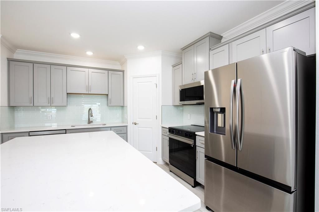 10534 Fountain Palm CIR, BOKEELIA, FL 33922 — photo 5