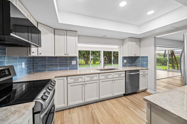 433 Pine Villa Drive, Atlantis, FL 33462