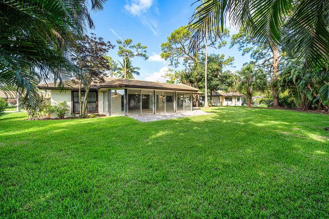 433 Pine Villa Drive, Atlantis, FL 33462