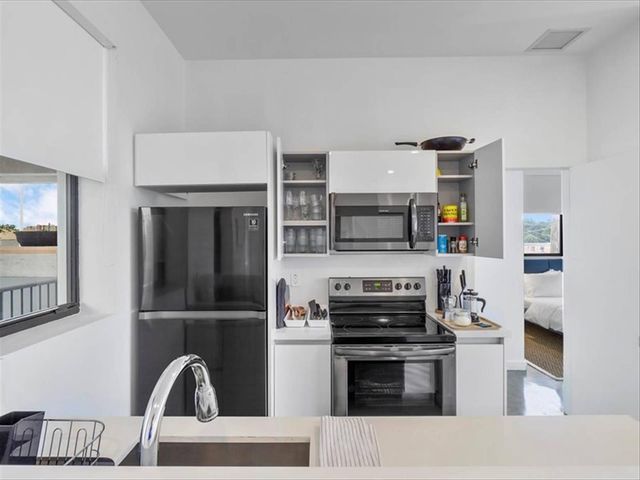 1053 NW 29th Street Casa Flambo, Miami, FL 33127