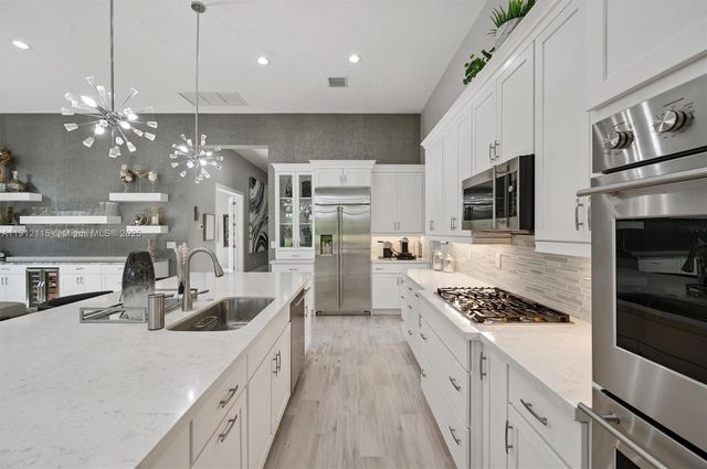 12065 N Kalmar Cir, Parkland, FL 33076