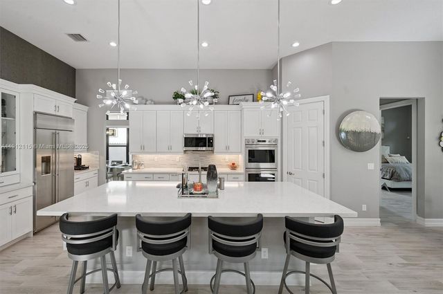 12065 N Kalmar Cir, Parkland, FL 33076