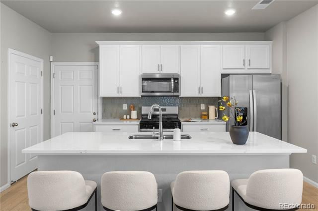 5077 S Robb Street, Littleton, CO 80127