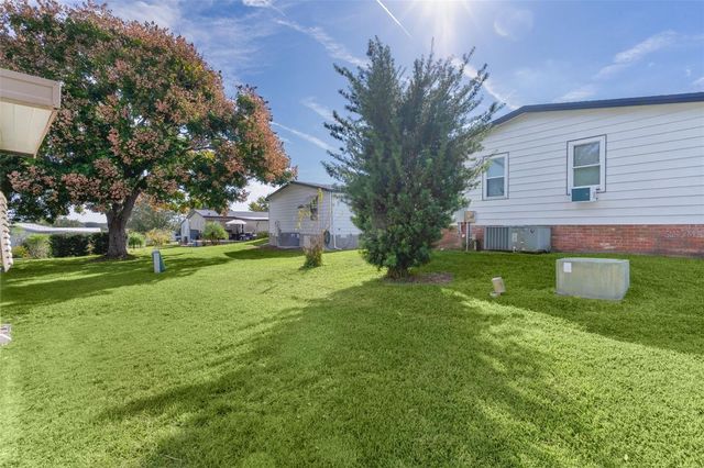 1717 PALM AIRE DRIVE, Lady Lake, FL 32159