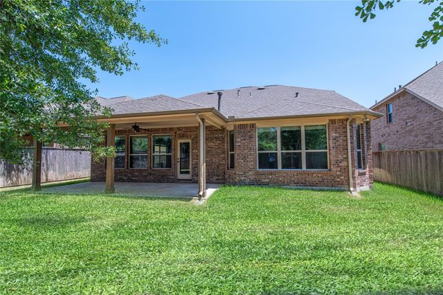 7 Whispering Thicket Place, Tomball, TX 77375