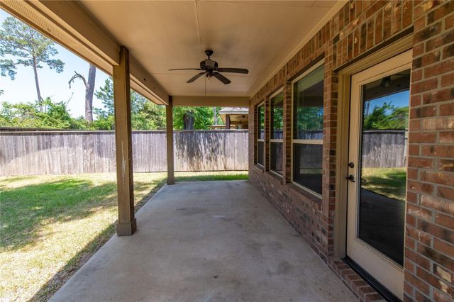 7 Whispering Thicket Place, Tomball, TX 77375