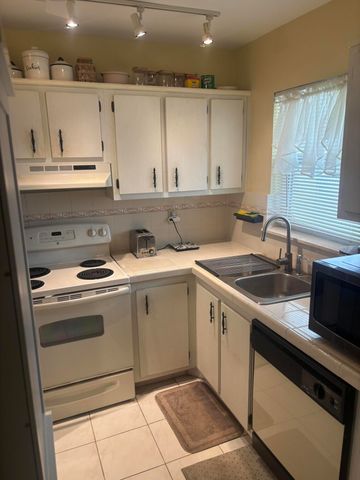 6670 ROYAL PALM Boulevard 308K, Margate, FL 33063