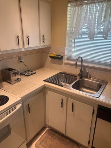 6670 ROYAL PALM Boulevard 308K, Margate, FL 33063