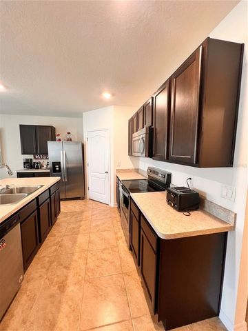 1267 IGUANA LOOP, Davenport, FL 33897